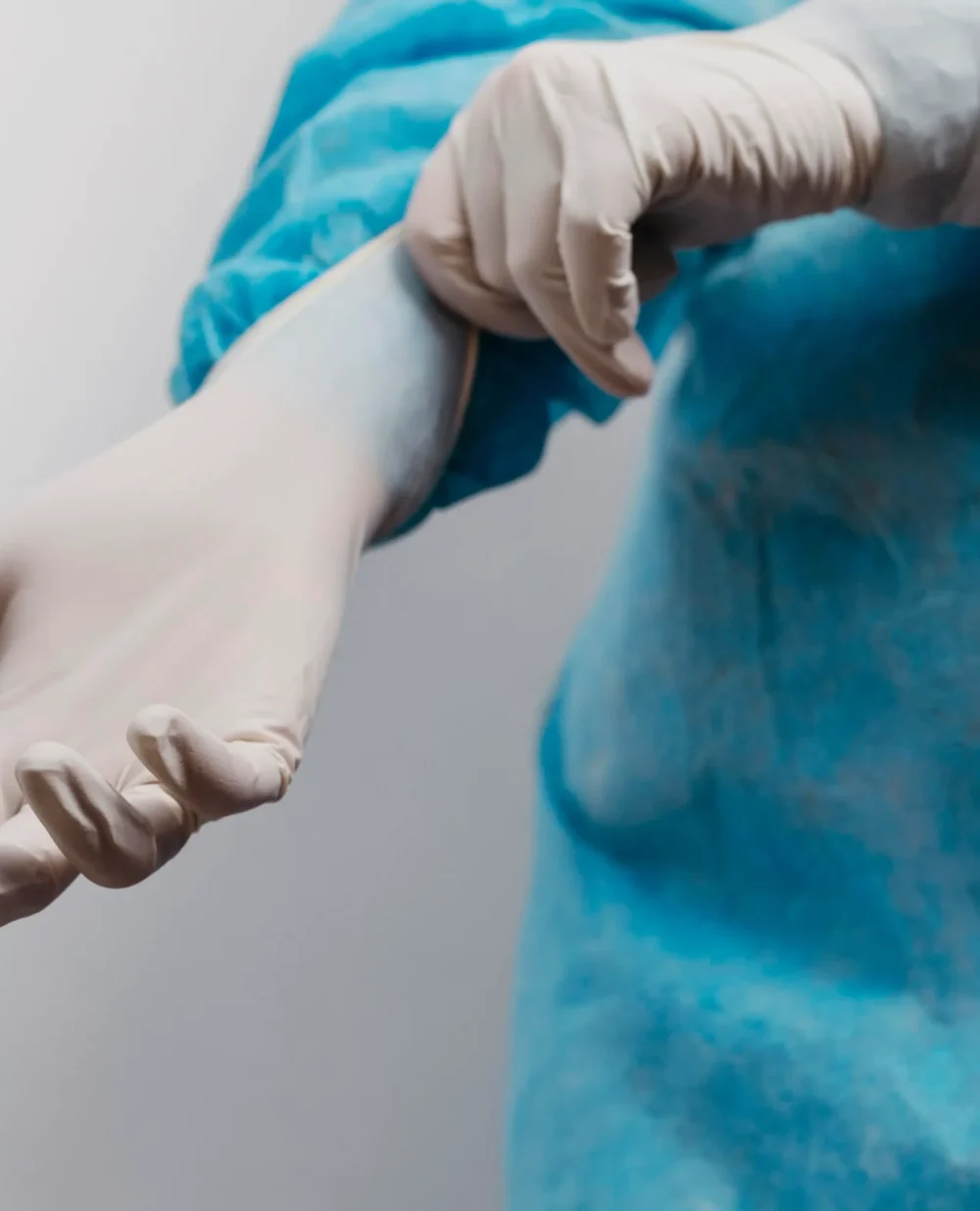 young-doctor-wearing-surgical-gloves